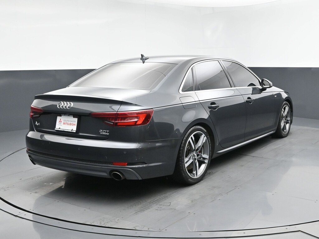 2018 Audi A4 Located at South Shore Mitsubishi light-box-slides