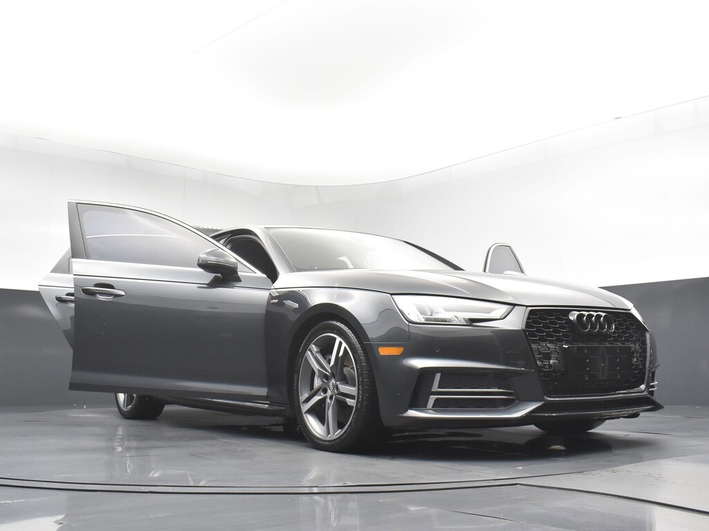 2018 Audi A4 Located at South Shore Mitsubishi light-box-slides