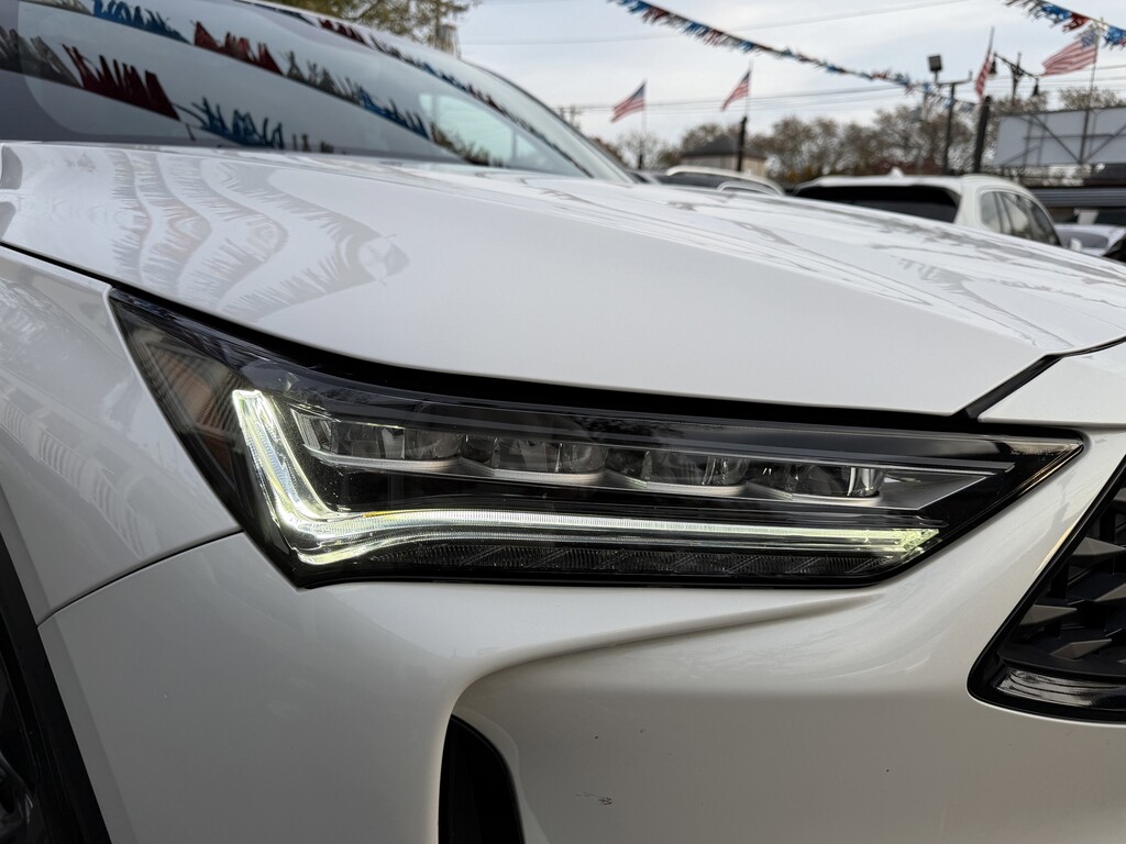 2023 Acura MDX Located at South Shore Mitsubishi light-box-slides