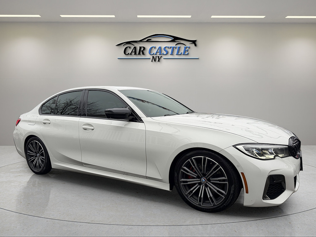 2021 BMW 3 Series Located at South Shore Mitsubishi light-box-slides