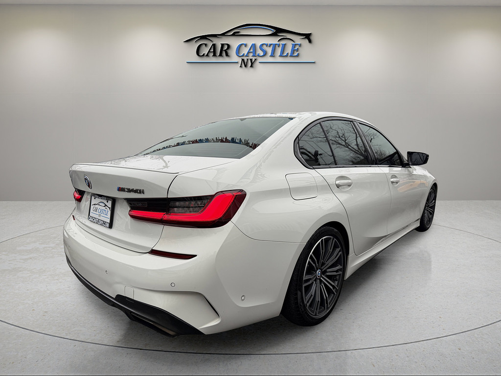 2021 BMW 3 Series Located at South Shore Mitsubishi slide-image