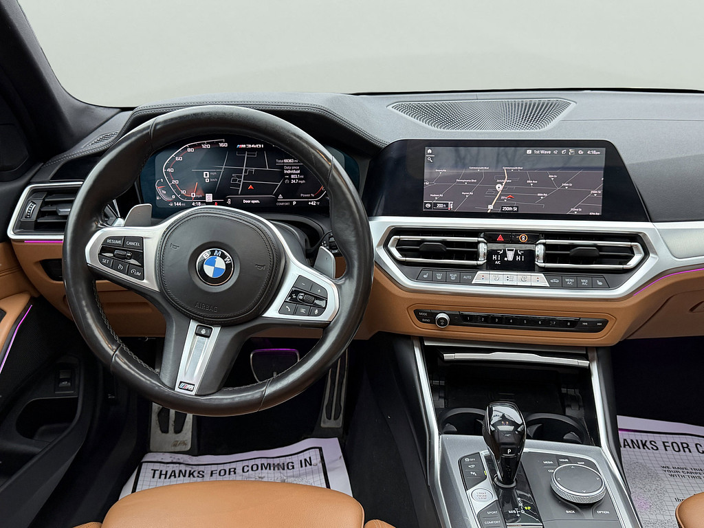 2021 BMW 3 Series Located at South Shore Mitsubishi light-box-slides