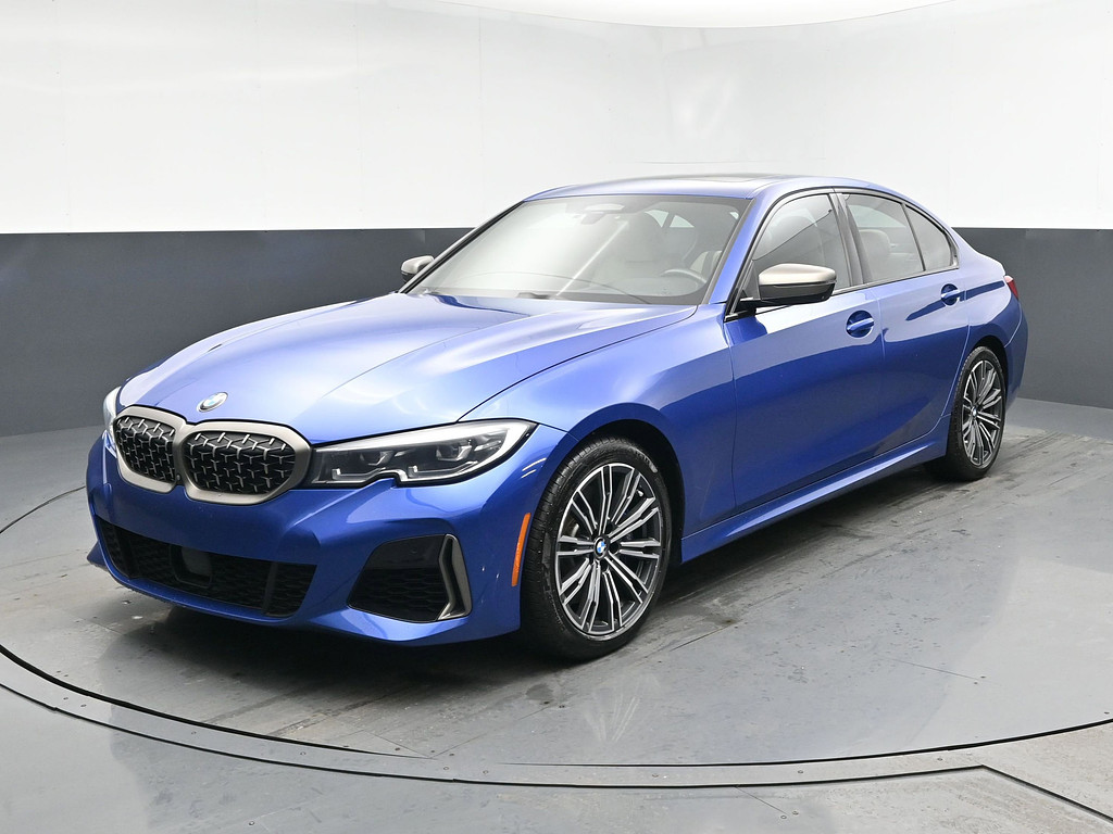 2021 BMW 3 Series Located at South Shore Mitsubishi slide-image