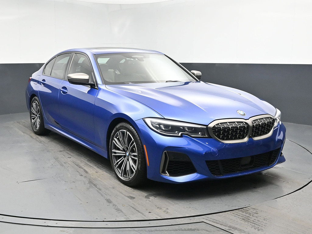 2021 BMW 3 Series Located at South Shore Mitsubishi light-box-slides