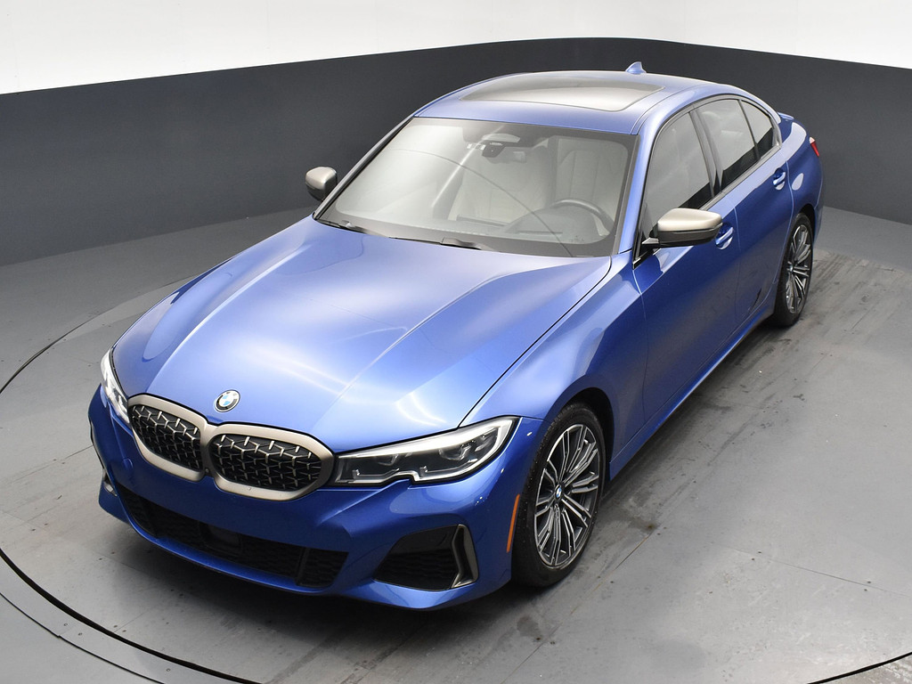 2021 BMW 3 Series Located at South Shore Mitsubishi light-box-slides