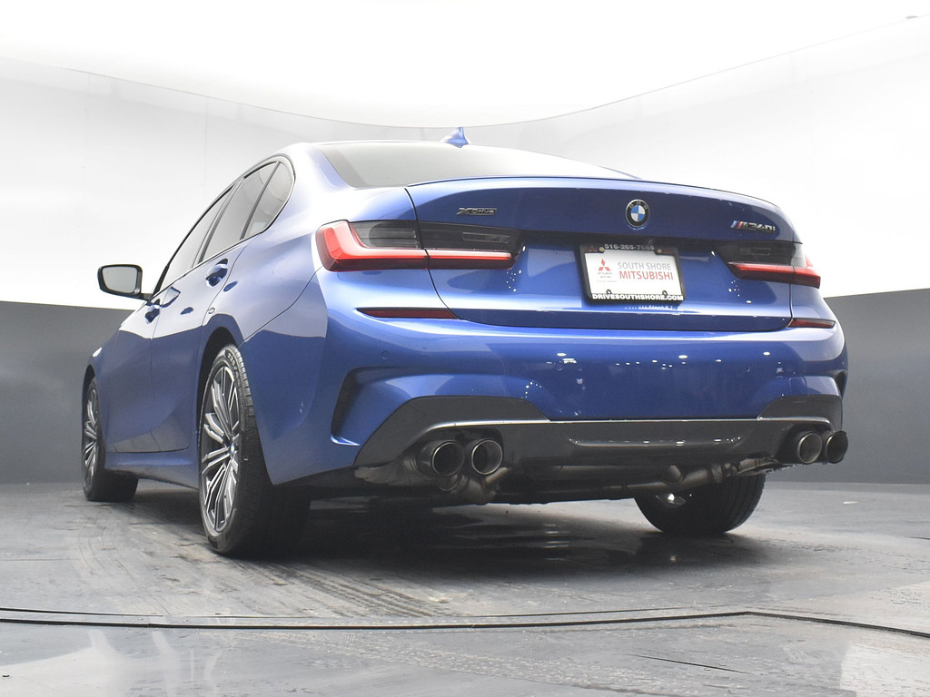 2021 BMW 3 Series Located at South Shore Mitsubishi light-box-slides