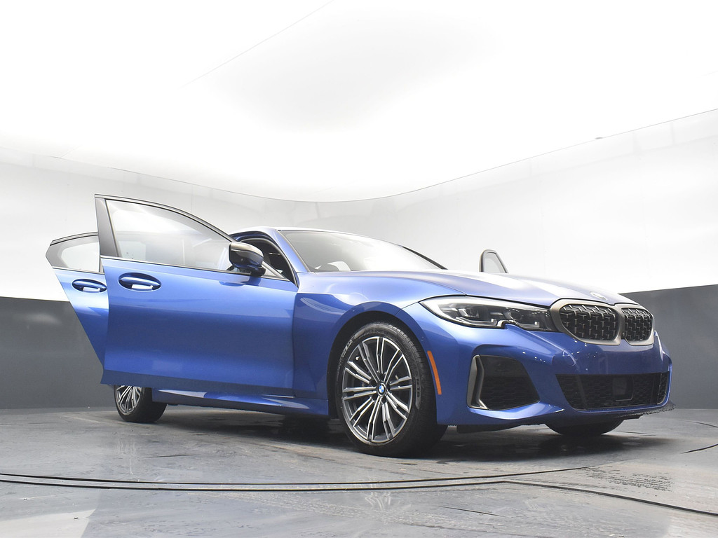2021 BMW 3 Series Located at South Shore Mitsubishi light-box-slides