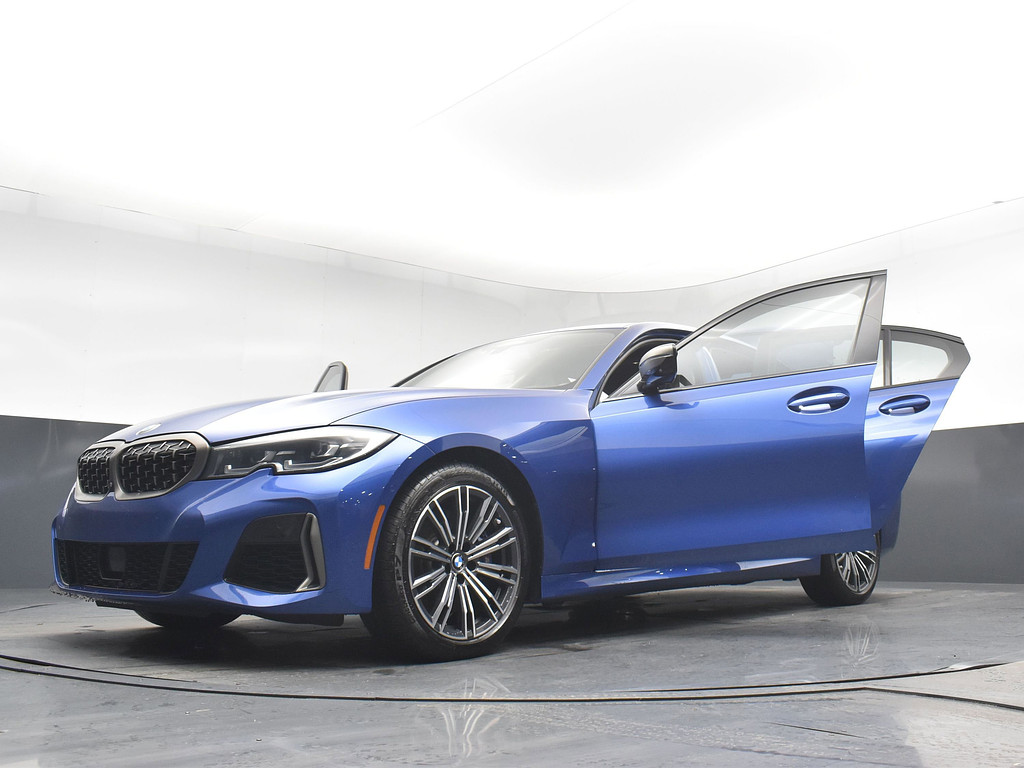 2021 BMW 3 Series Located at South Shore Mitsubishi light-box-slides