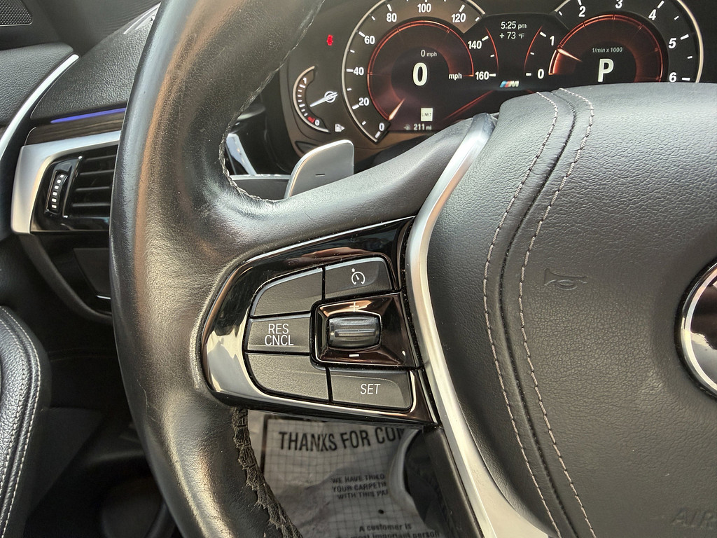 2019 BMW 5 Series Located at South Shore Mitsubishi light-box-slides