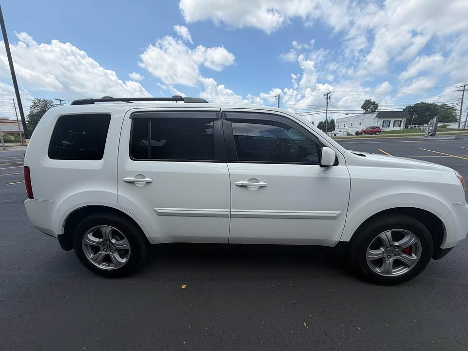 2014 Honda Pilot 4WD Located at Cartime slide-image