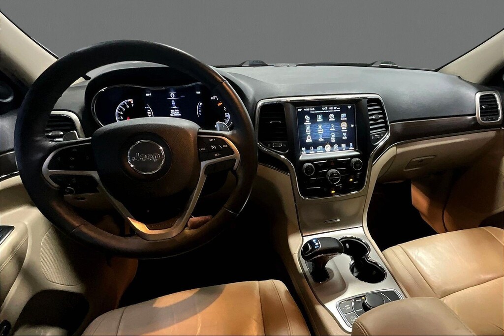 2014 Jeep GRAND CHEROKEE Located at Cole Auto Outlet light-box-slides