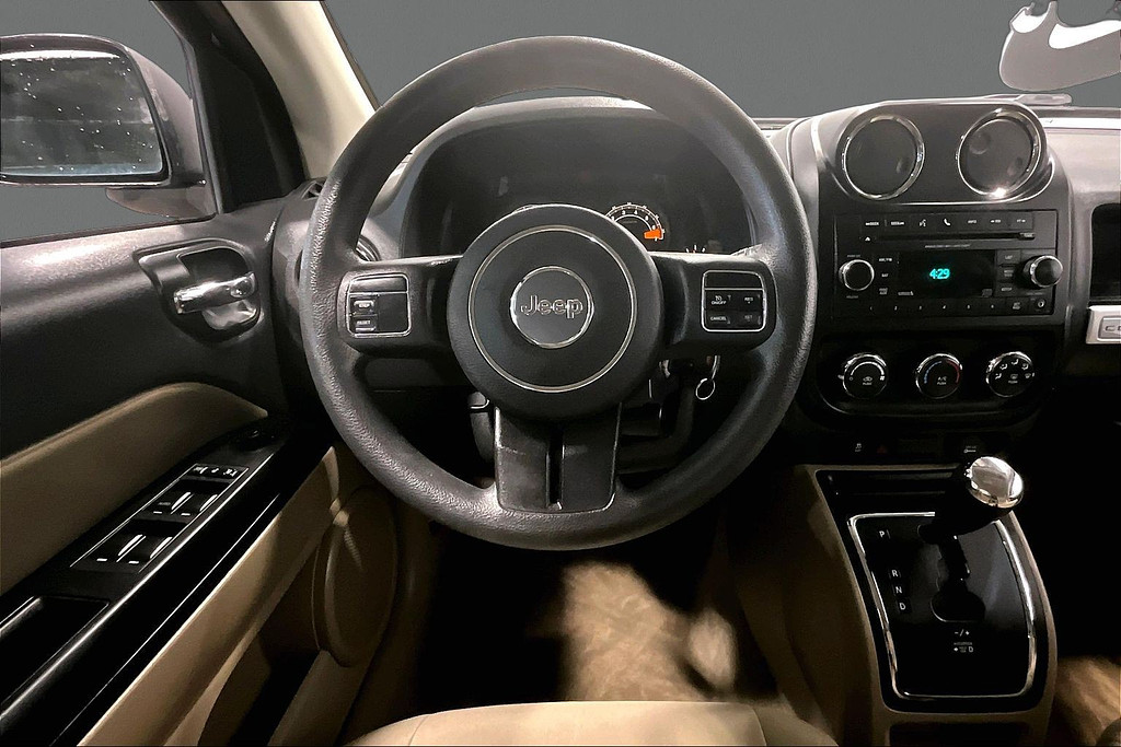 2015 Jeep COMPASS Located at Cole Auto Outlet light-box-slides