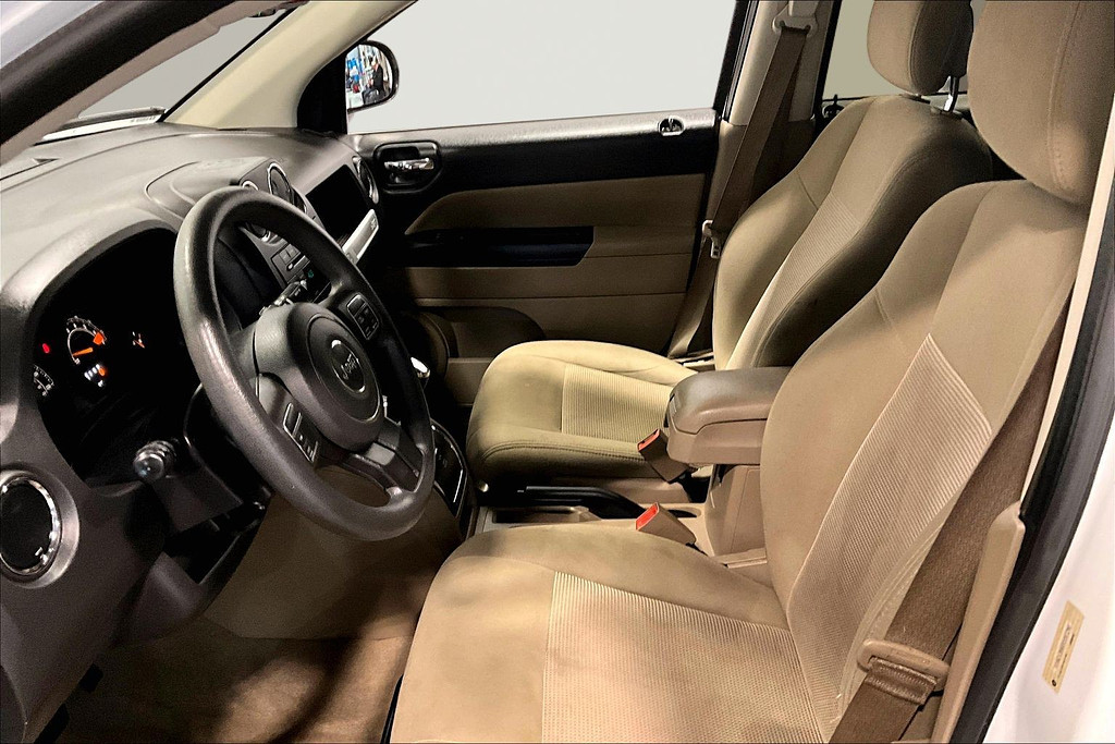 2015 Jeep COMPASS Located at Cole Auto Outlet light-box-slides