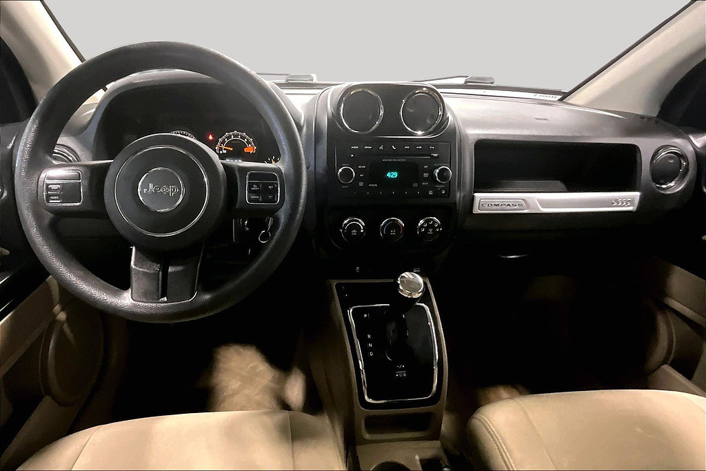 2015 Jeep COMPASS Located at Cole Auto Outlet light-box-slides