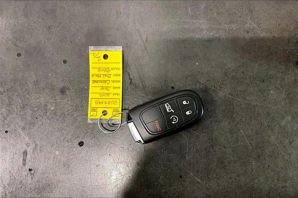 2015 Jeep CHEROKEE Located at Cole Auto Outlet slide-image