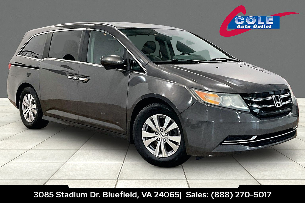 2016 Honda ODYSSEY Located at Cole Auto Outlet slide-image