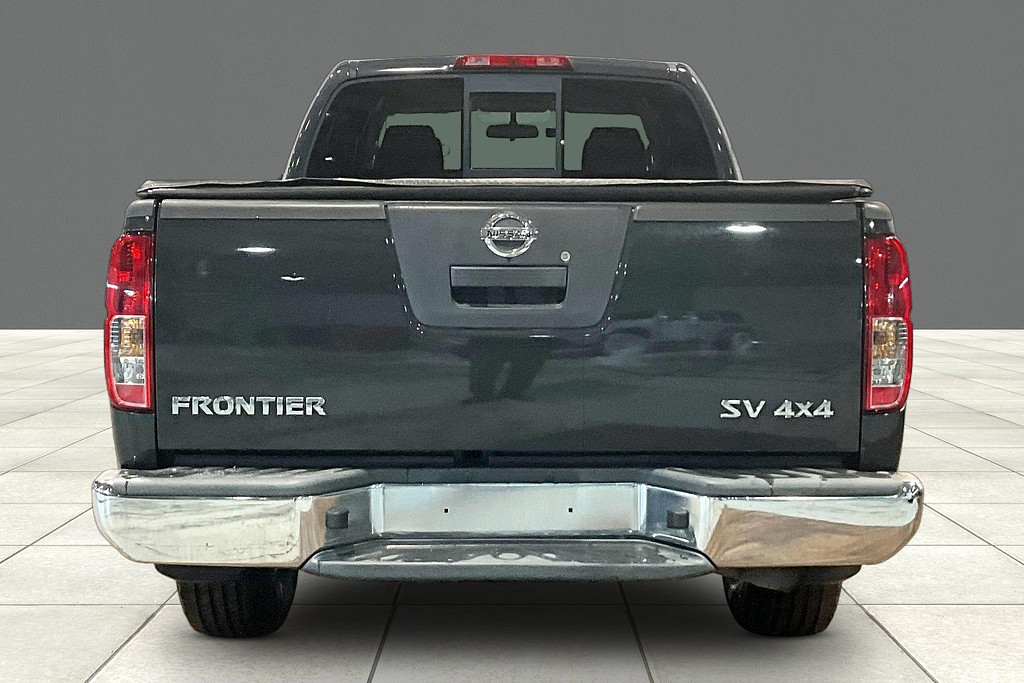 2012 Nissan FRONTIER Located at Cole Auto Outlet light-box-slides