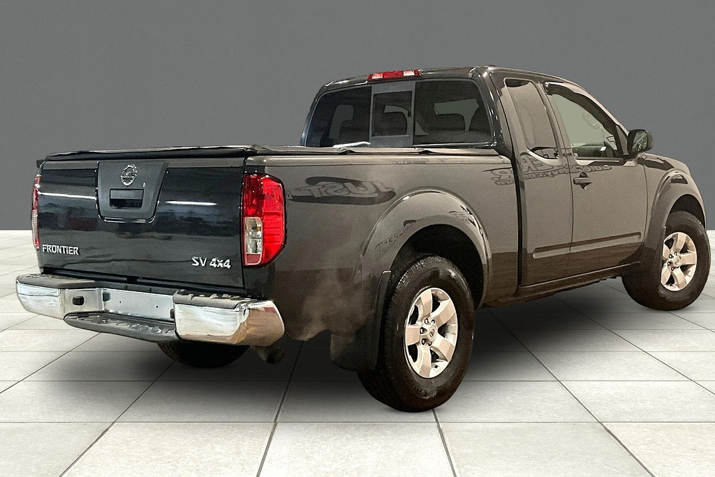 2012 Nissan FRONTIER Located at Cole Auto Outlet light-box-slides