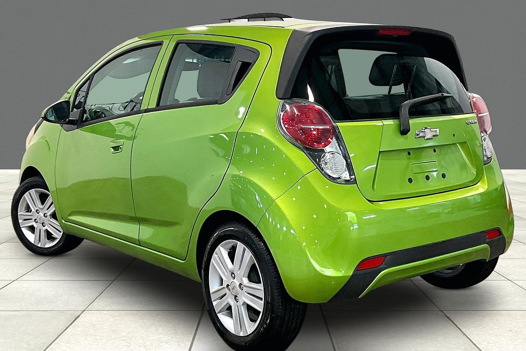2014 Chevrolet SPARK Located at Cole Auto Outlet light-box-slides
