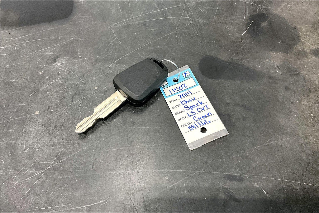 2014 Chevrolet SPARK Located at Cole Auto Outlet light-box-slides