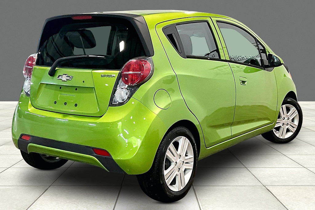 2014 Chevrolet SPARK Located at Cole Auto Outlet light-box-slides
