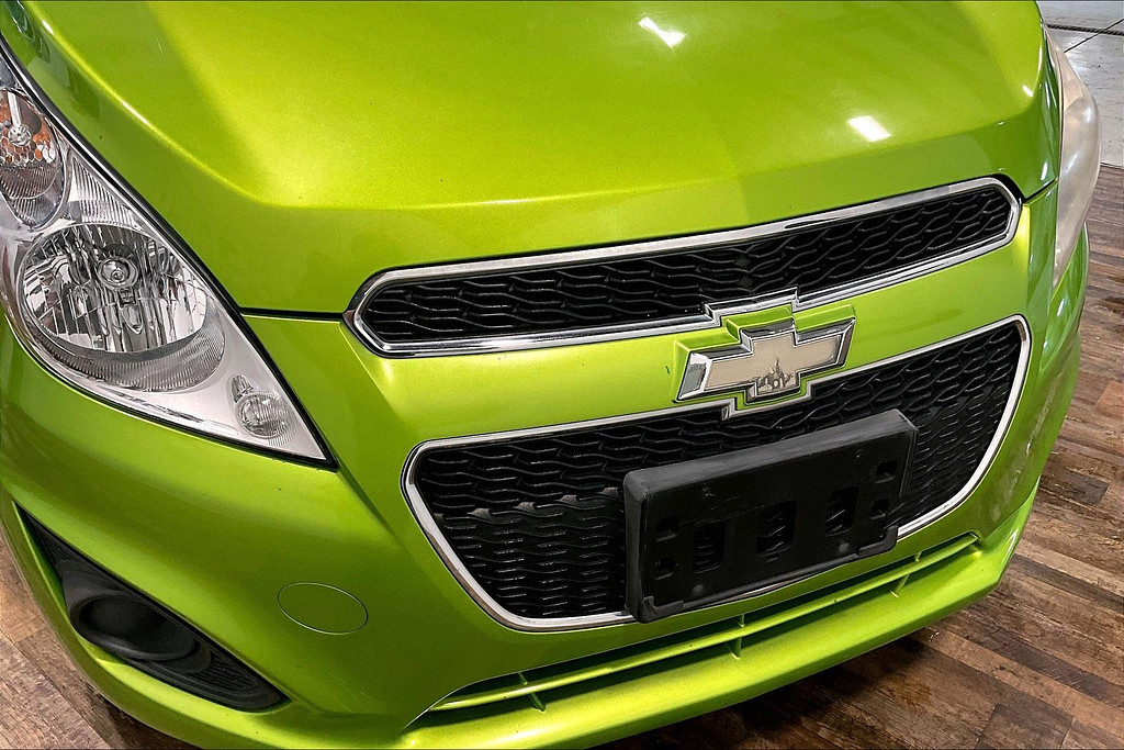 2014 Chevrolet SPARK Located at Cole Auto Outlet light-box-slides
