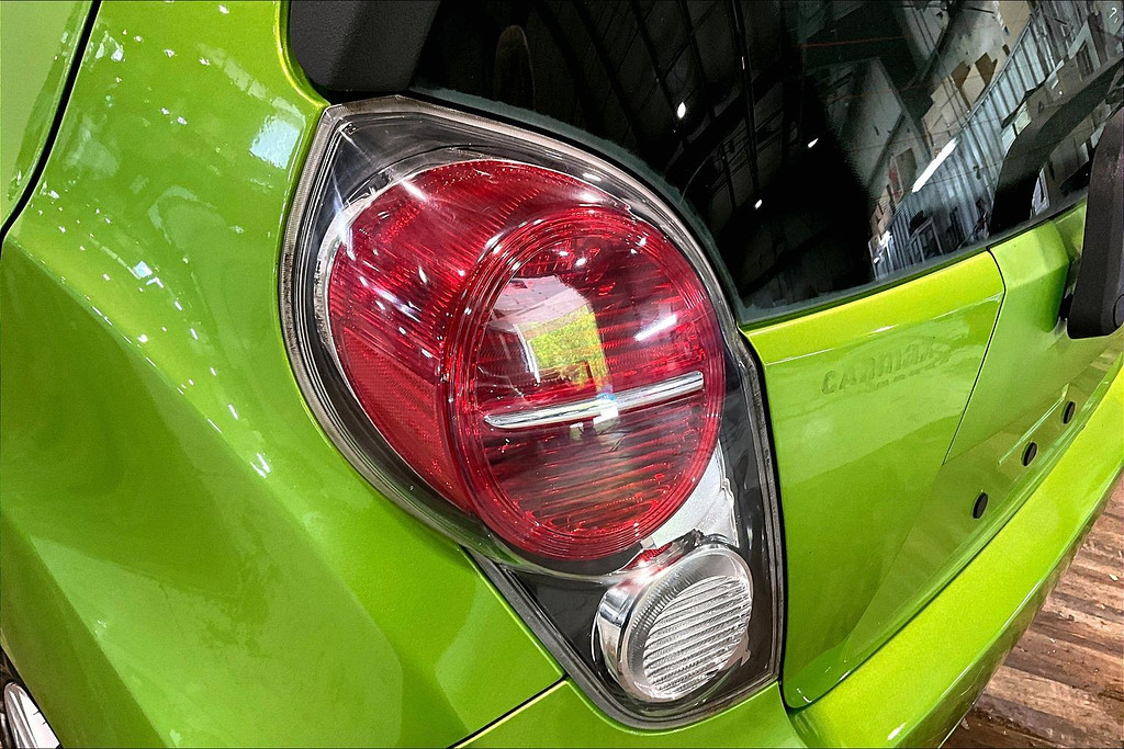 2014 Chevrolet SPARK Located at Cole Auto Outlet light-box-slides