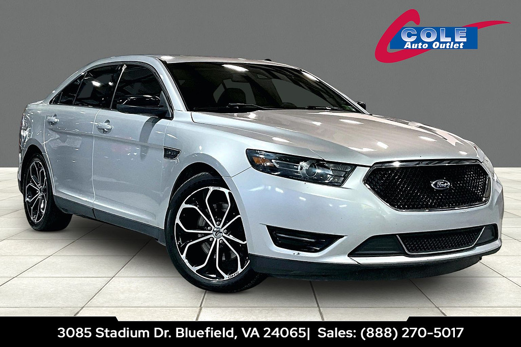 2014 Ford TAURUS Located at Cole Auto Outlet slide-image