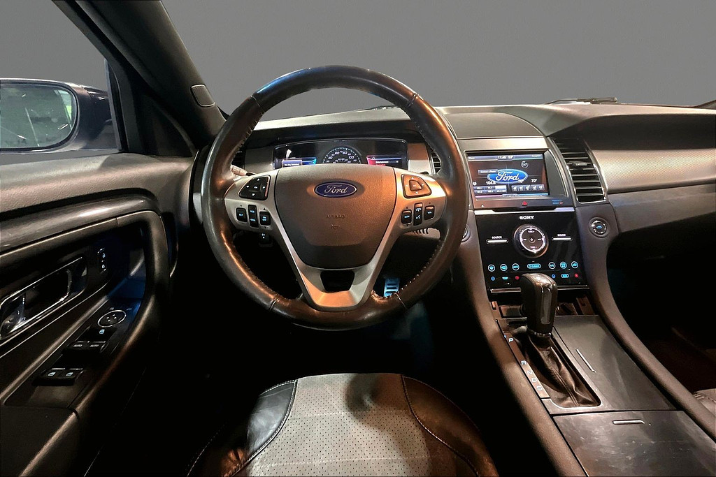 2014 Ford TAURUS Located at Cole Auto Outlet light-box-slides