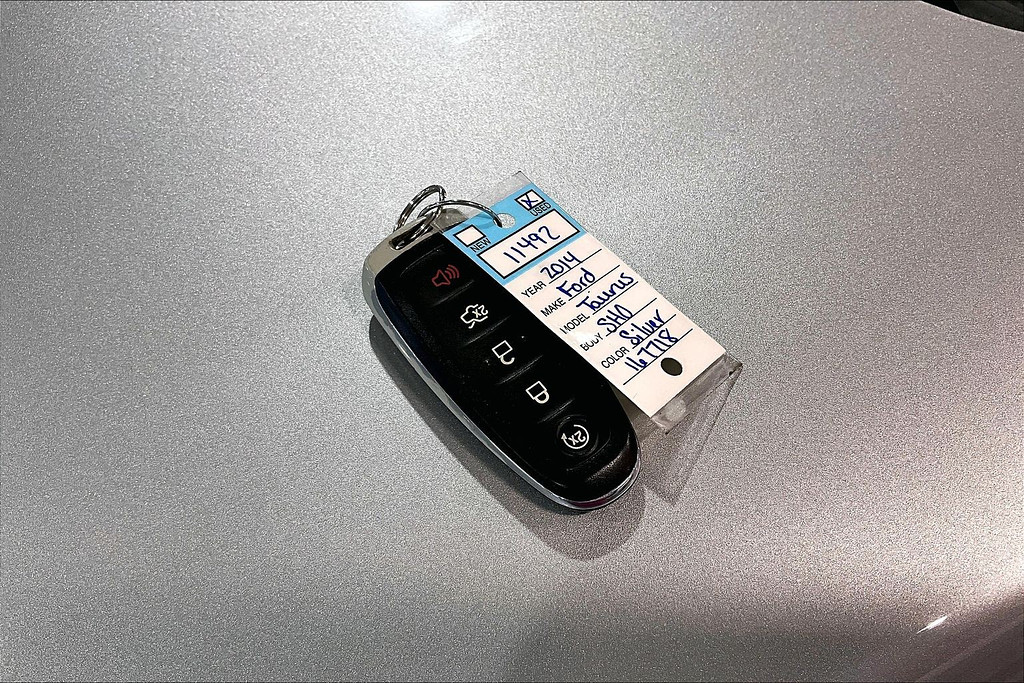 2014 Ford TAURUS Located at Cole Auto Outlet light-box-slides