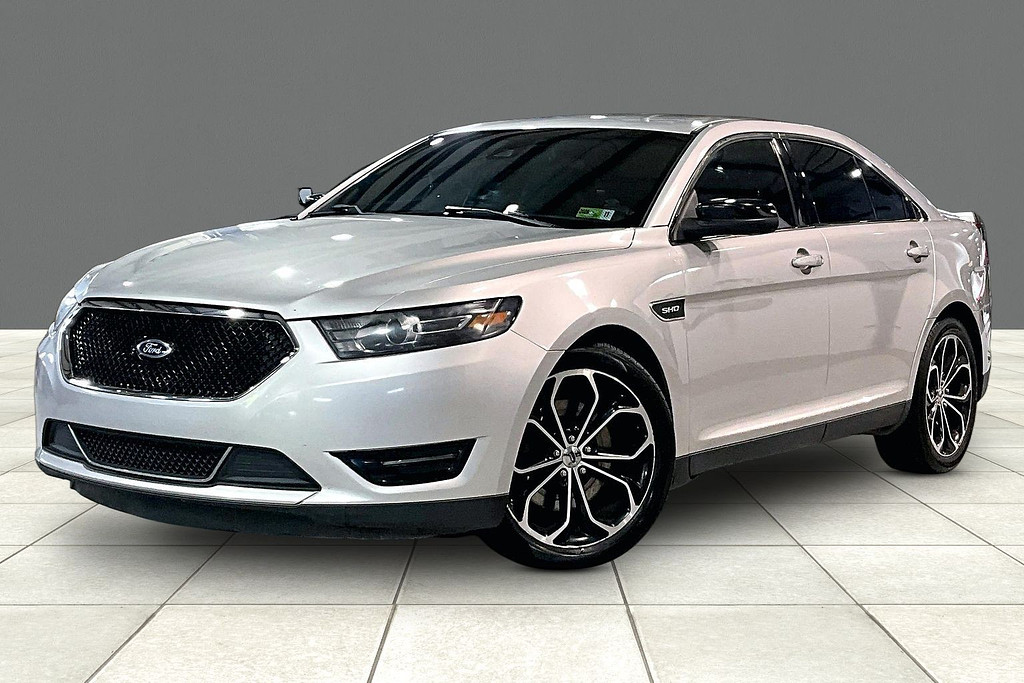 2014 Ford TAURUS Located at Cole Auto Outlet slide-image