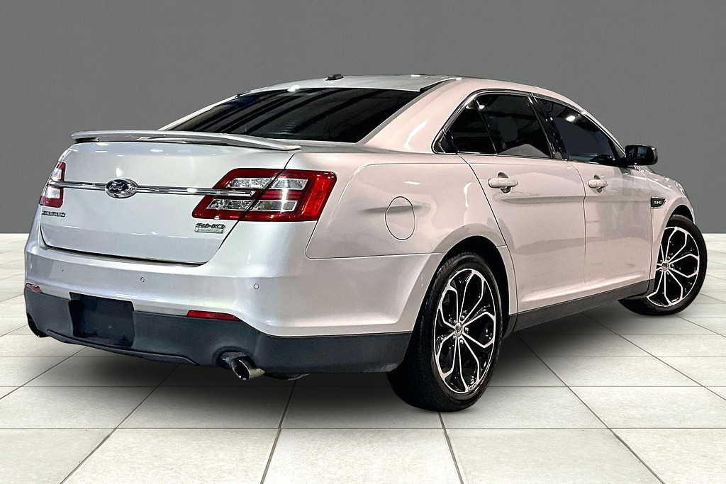 2014 Ford TAURUS Located at Cole Auto Outlet light-box-slides