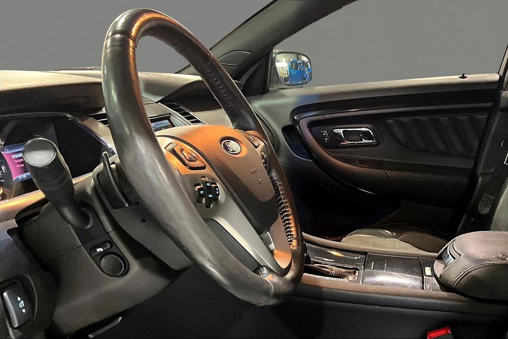 2014 Ford TAURUS Located at Cole Auto Outlet light-box-slides
