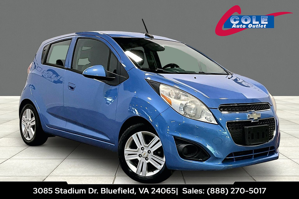 2014 Chevrolet SPARK Located at Cole Auto Outlet light-box-slides