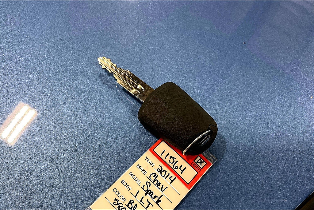 2014 Chevrolet SPARK Located at Cole Auto Outlet light-box-slides