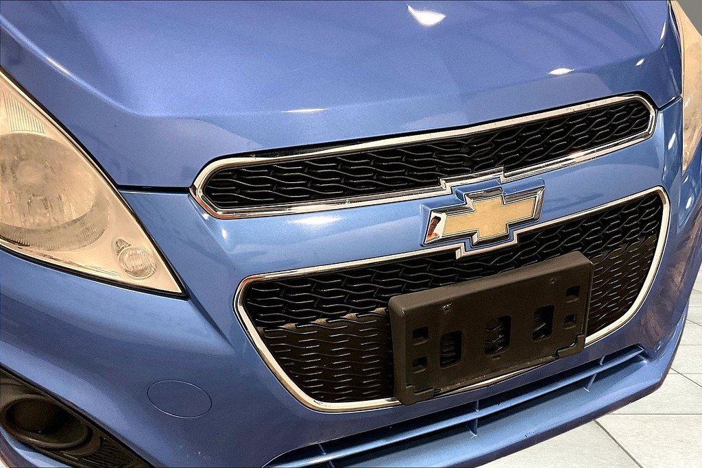 2014 Chevrolet SPARK Located at Cole Auto Outlet light-box-slides