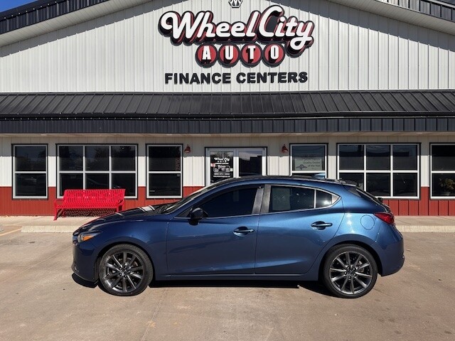 2018 Mazda MAZDA3 TOURING Located at Wheel City Auto Sioux Falls light-box-slides