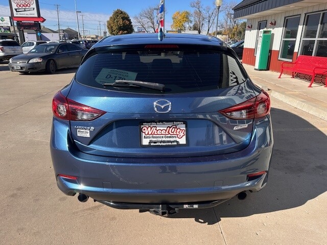2018 Mazda MAZDA3 TOURING Located at Wheel City Auto Sioux Falls light-box-slides