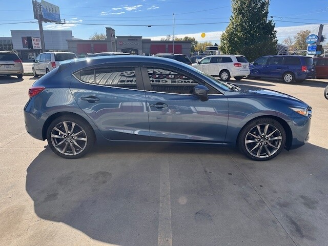 2018 Mazda MAZDA3 TOURING Located at Wheel City Auto Sioux Falls light-box-slides