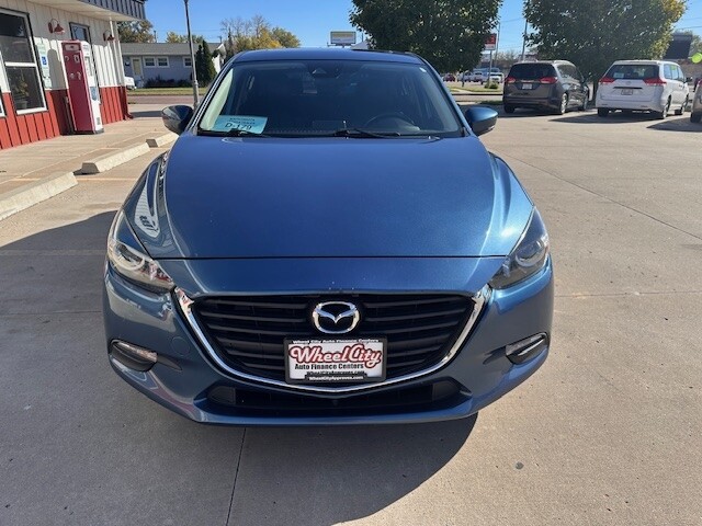 2018 Mazda MAZDA3 TOURING Located at Wheel City Auto Sioux Falls light-box-slides