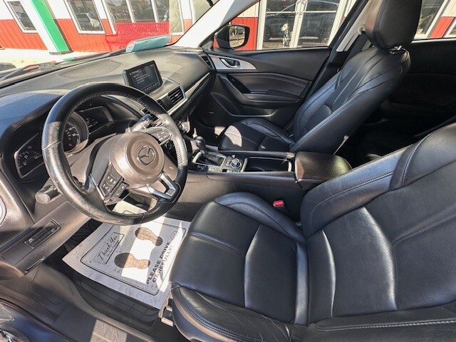 2018 Mazda MAZDA3 TOURING Located at Wheel City Auto Sioux Falls light-box-slides
