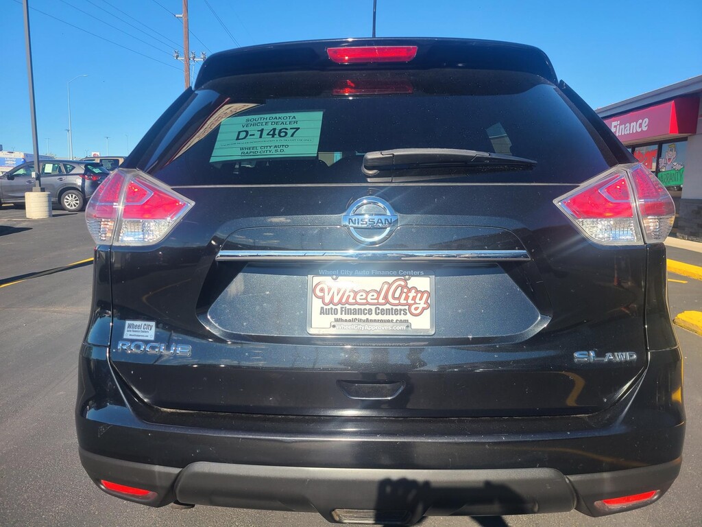 2016 Nissan ROGUE S SL SV Located at Wheel City Auto Rapid City slide-image