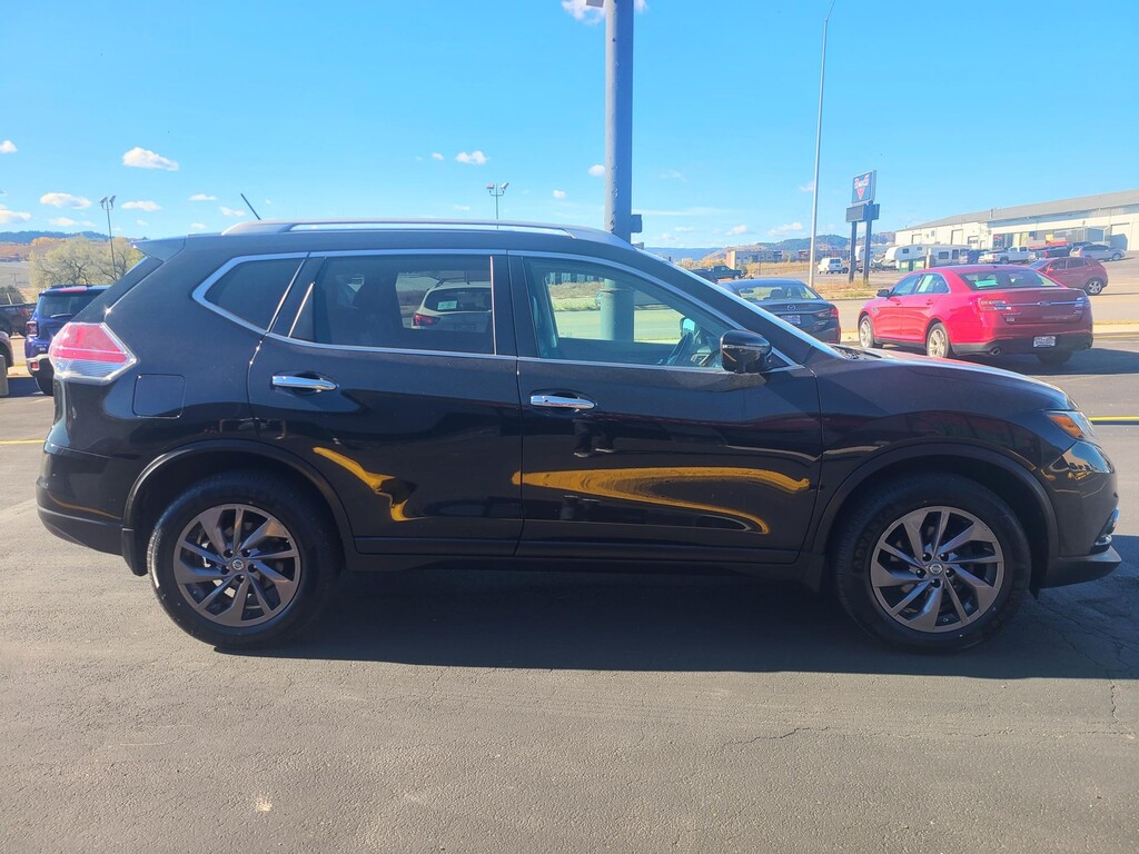 2016 Nissan ROGUE S SL SV Located at Wheel City Auto Rapid City light-box-slides