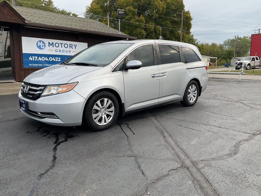 2014 Honda ODYSSEY Located at Motory Group Joplin slide-image