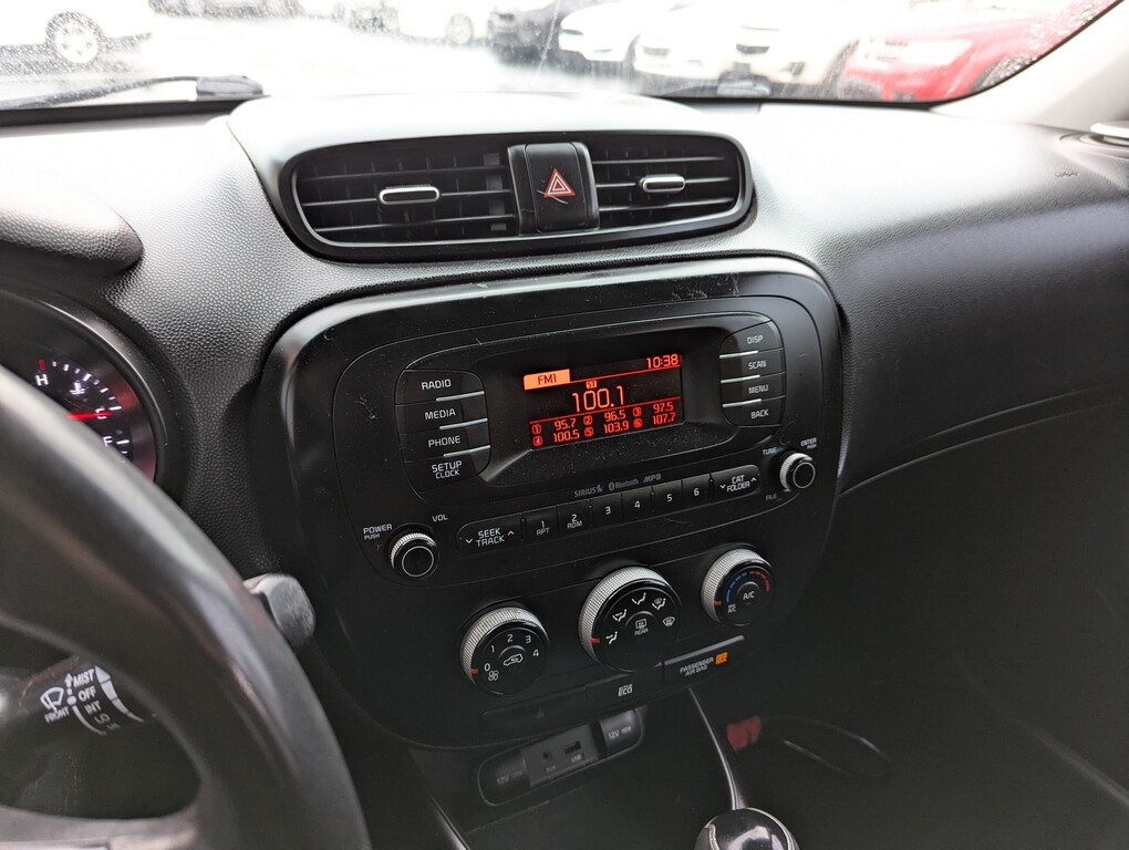 2015 Kia Soul Located at Circus Auto Sales slide-image