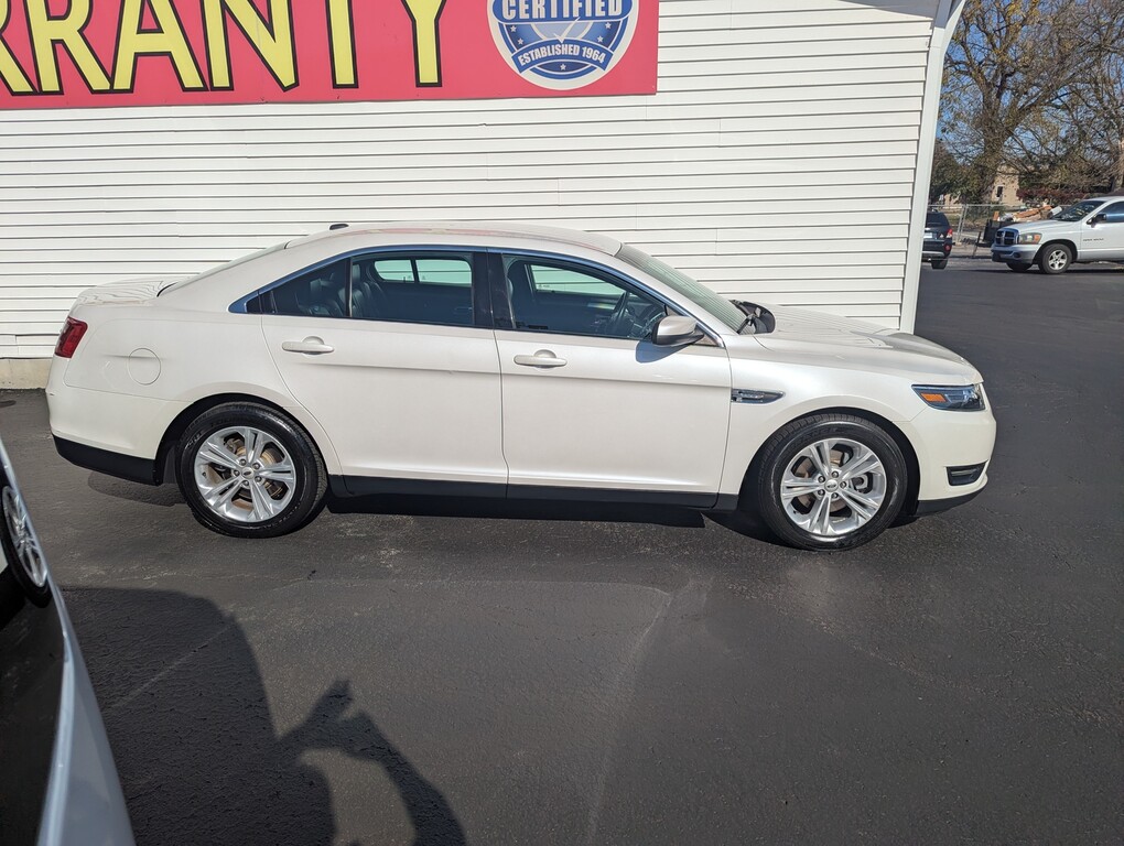 2014 Ford TAURUS SEL Located at Circus Auto Sales light-box-slides