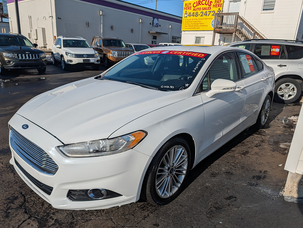 2013 Ford FUSION SE Located at Circus Auto Sales light-box-slides