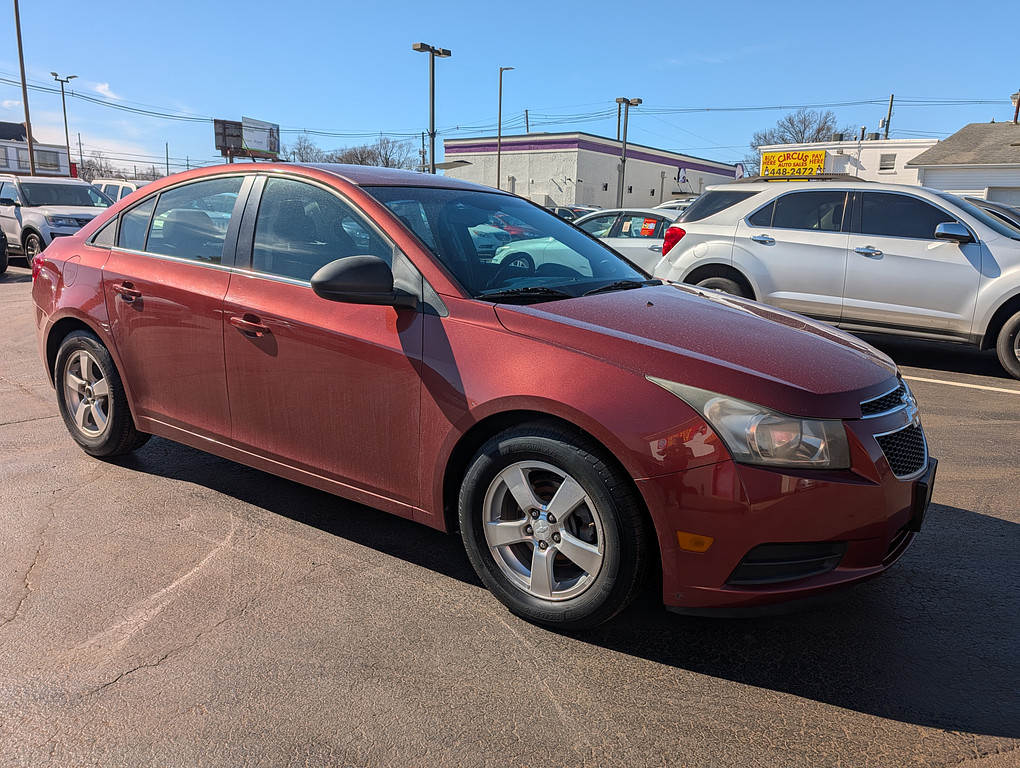 2012 Chevrolet CRUZE Located at Circus Auto Sales slide-image