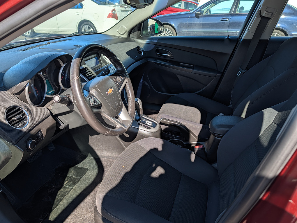 2012 Chevrolet CRUZE Located at Circus Auto Sales slide-image