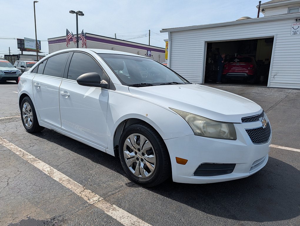 2012 Chevrolet CRUZE Located at Circus Auto Sales slide-image
